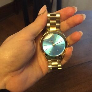 Michael Kors watch with blue face